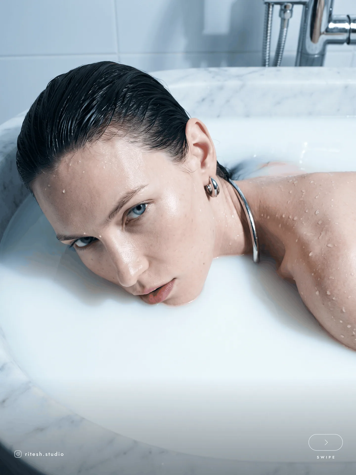 Close beauty portrait reflected in a pale milky surface