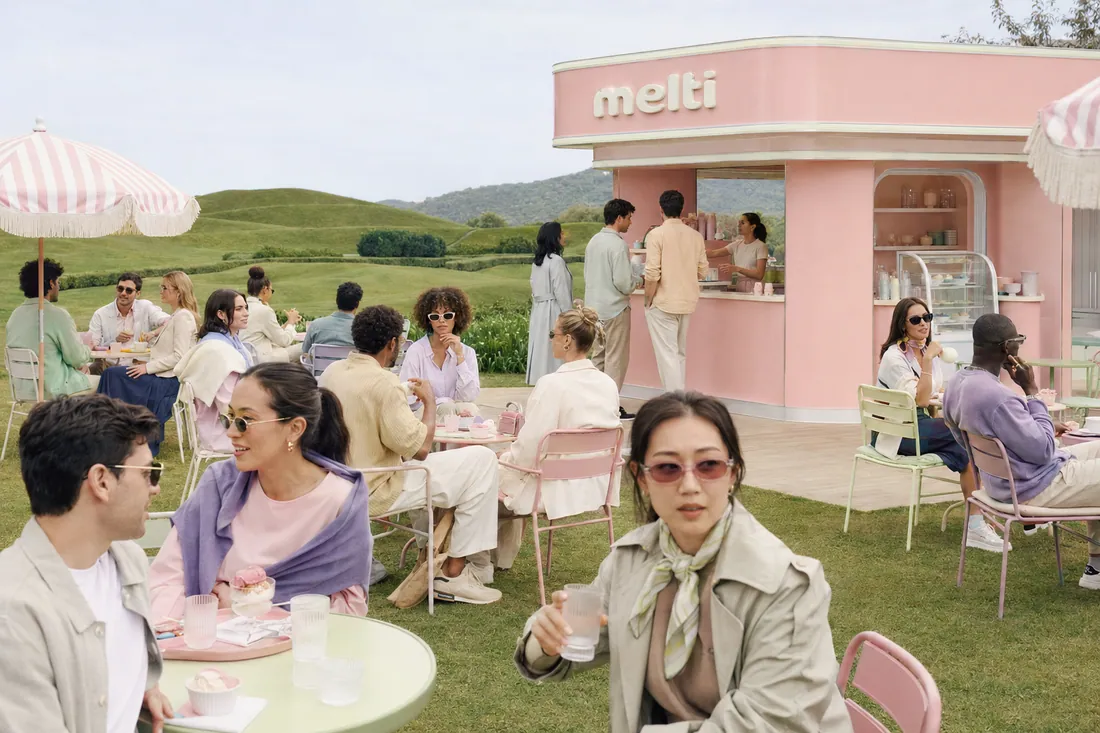 Friends outside a pink Melti ice-cream shop in the countryside